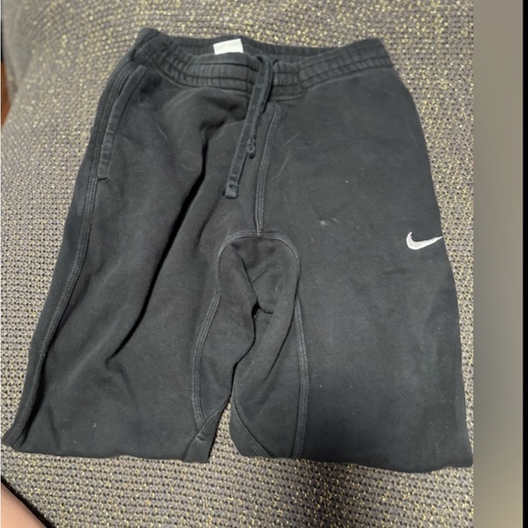 They are Nike sweat pants color is black and size small - Picture 1 of 3